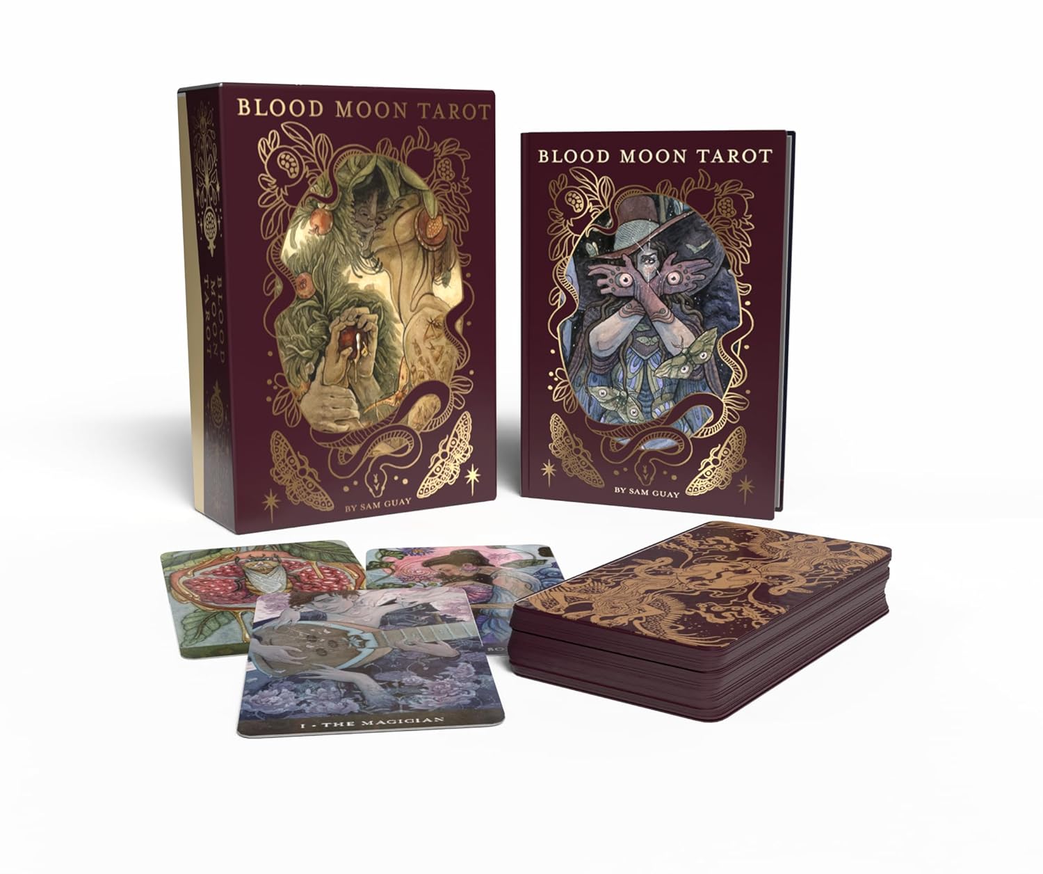 Blood Moon Tarot cards with ornate covers and cards displayed on a white background