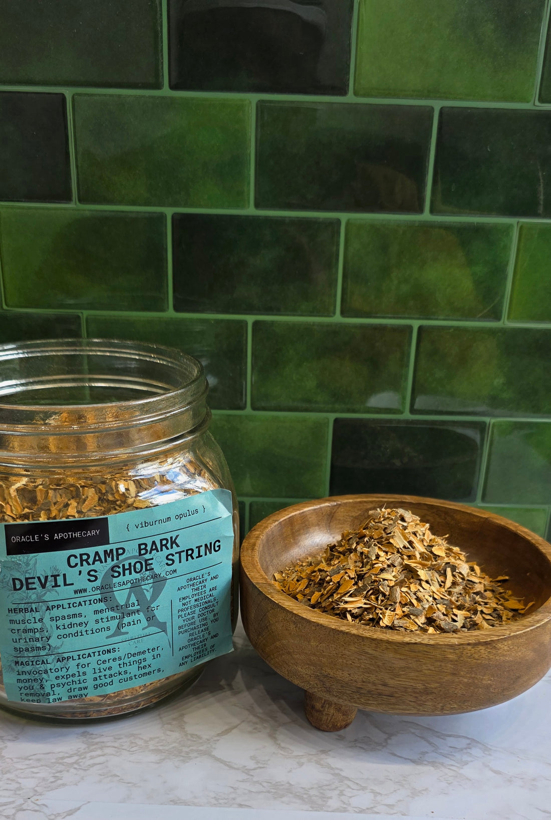 A clear glass jar labeled &
