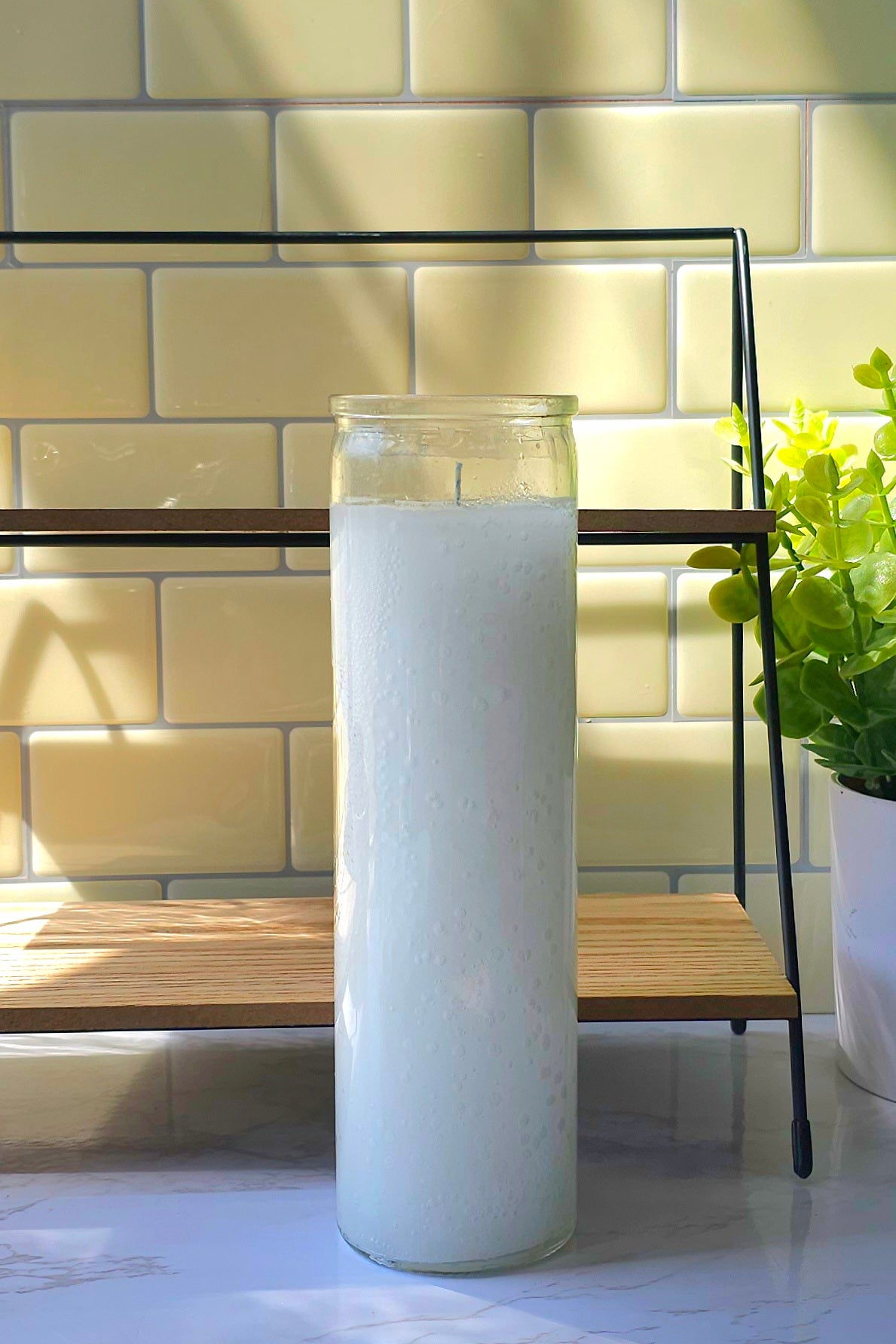 a white 7-Day Candle