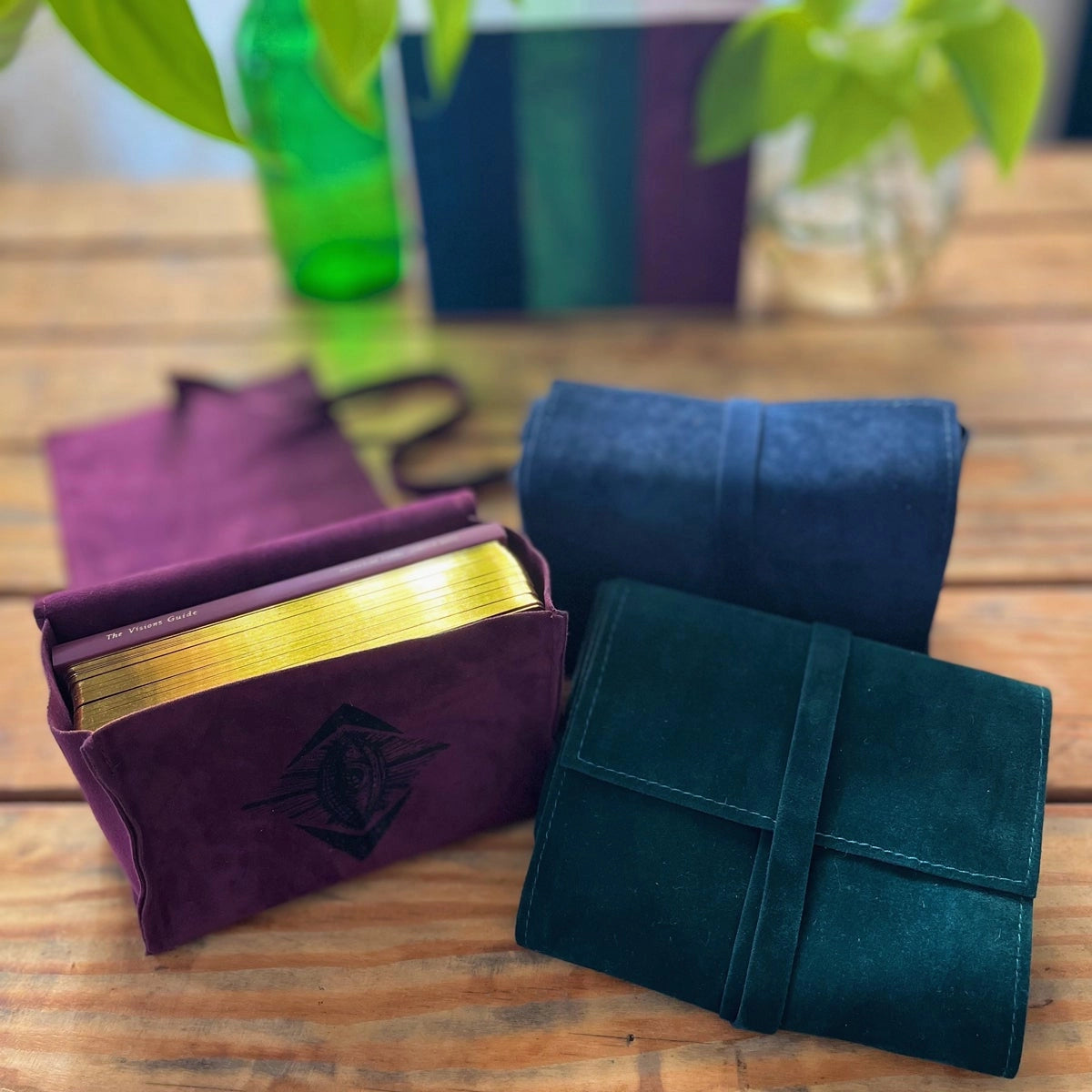 three Card Satchels with purple blue and green covers