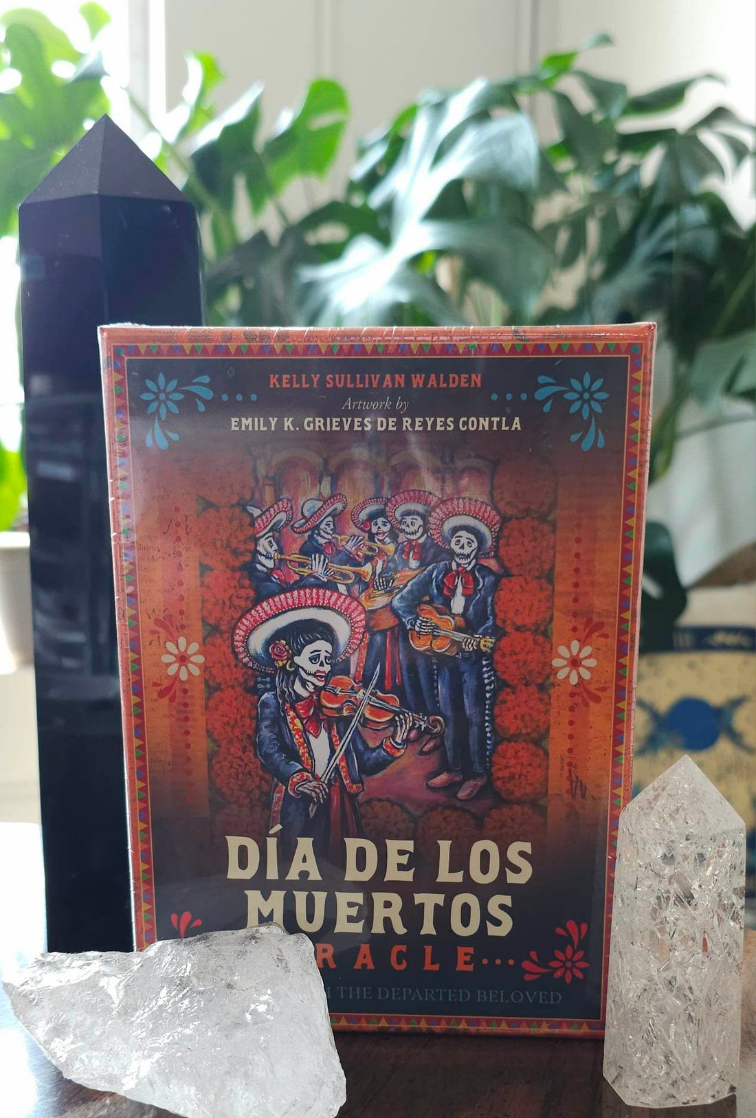 Dia De Los Muertos Oracle deck sitting on a table