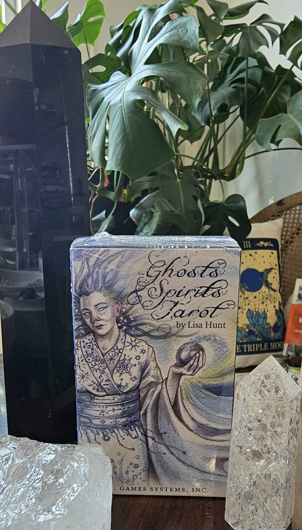 Ghosts and Spirits Tarot deck sitting on table