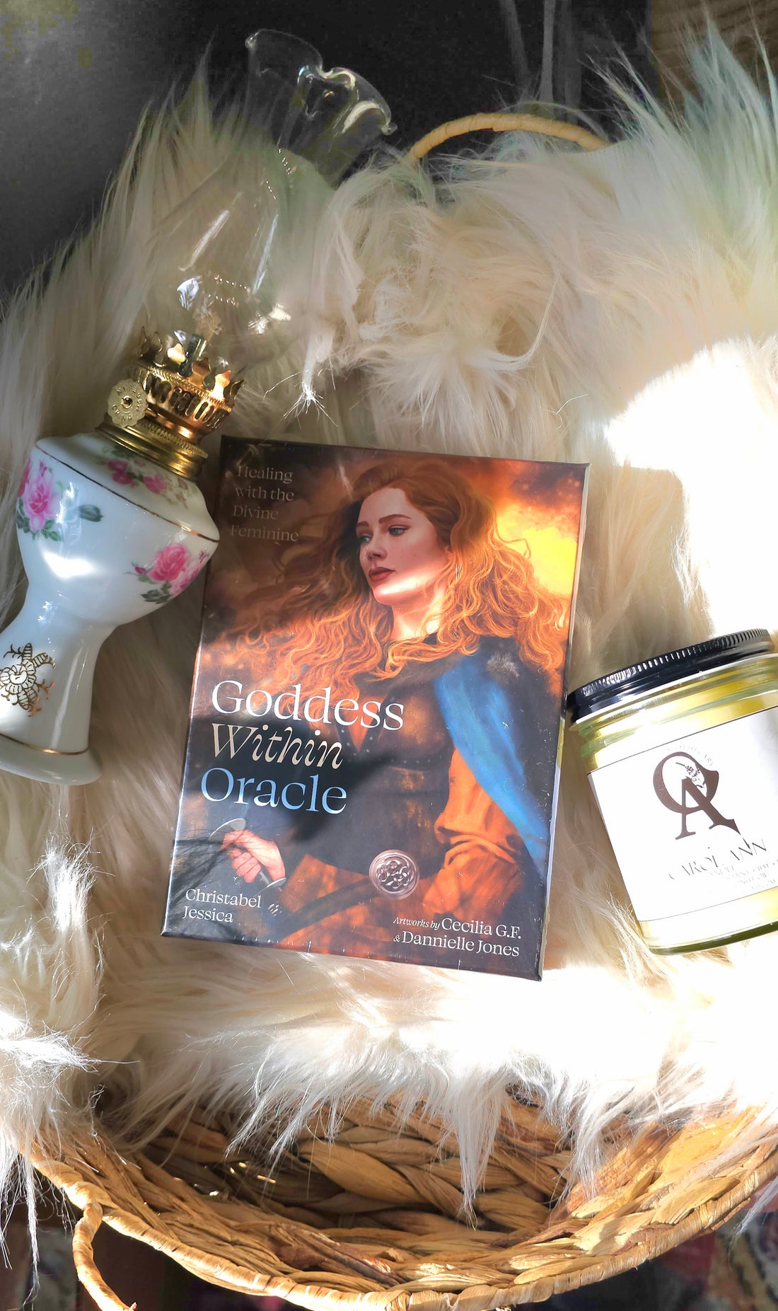 Goddess Within Oracle deck lying on a white shag