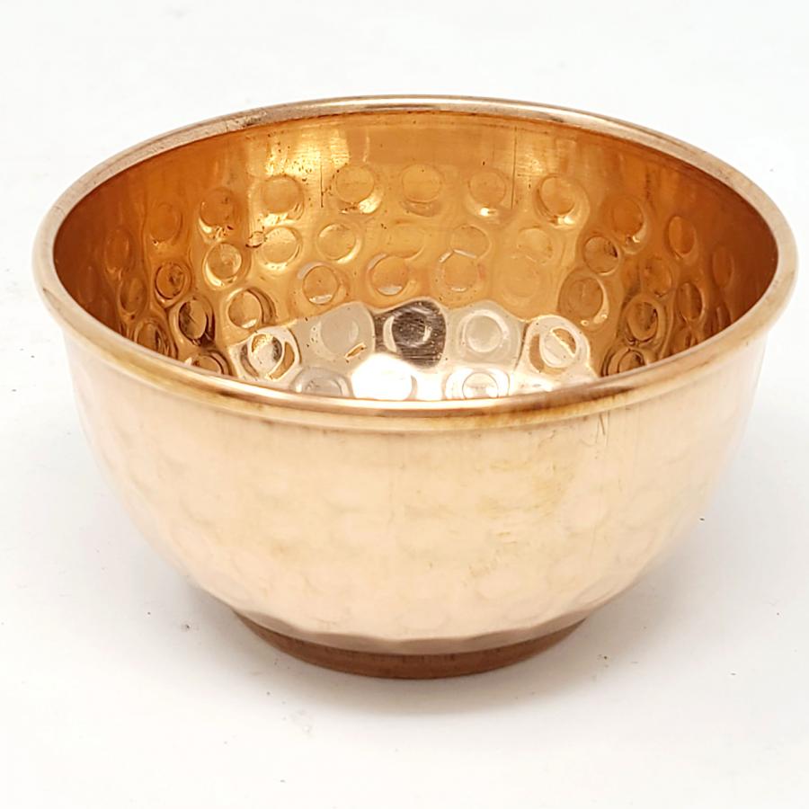 Hammered Copper Bowl sitting on white counter