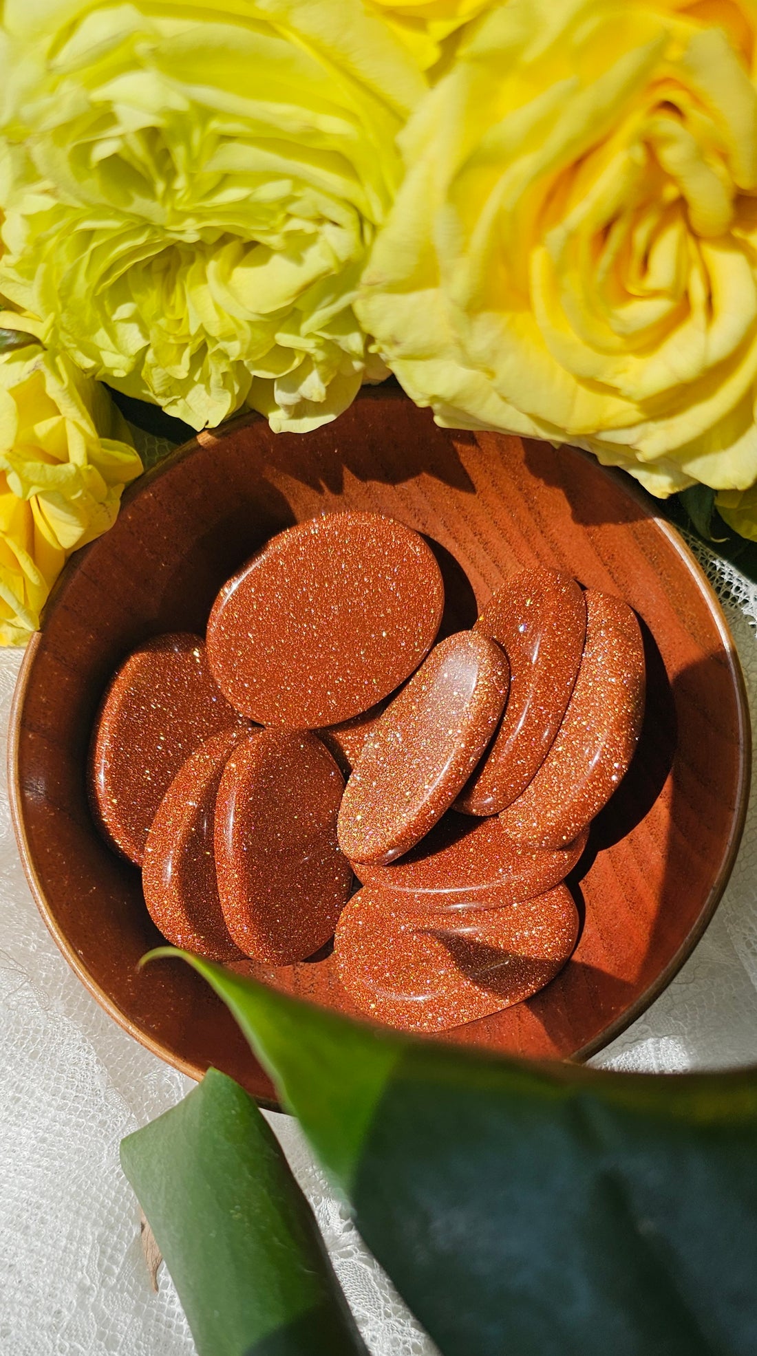 Happy Stones in a wooden bowl