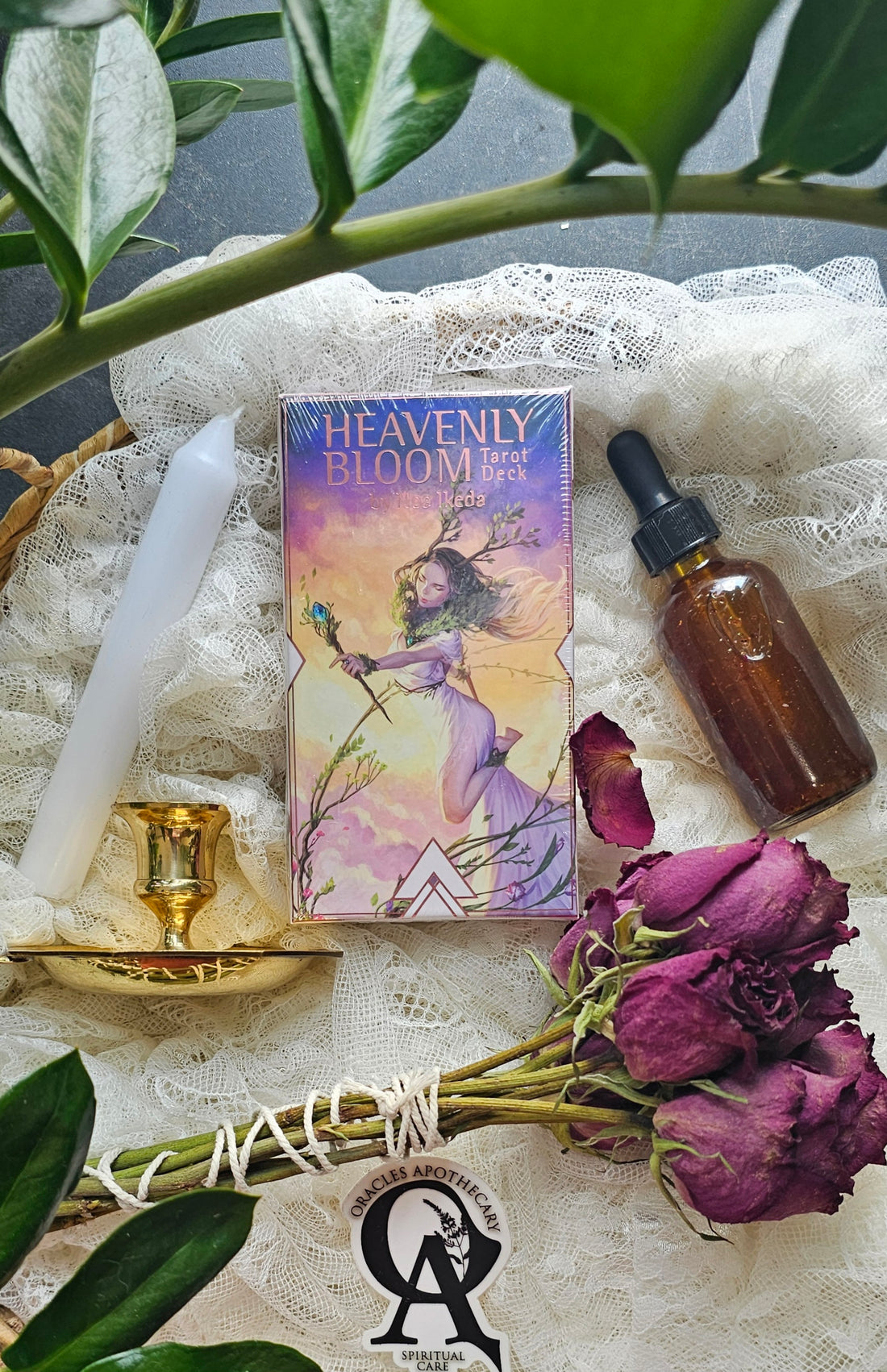 Heavenly Bloom Tarot Deck next to roses