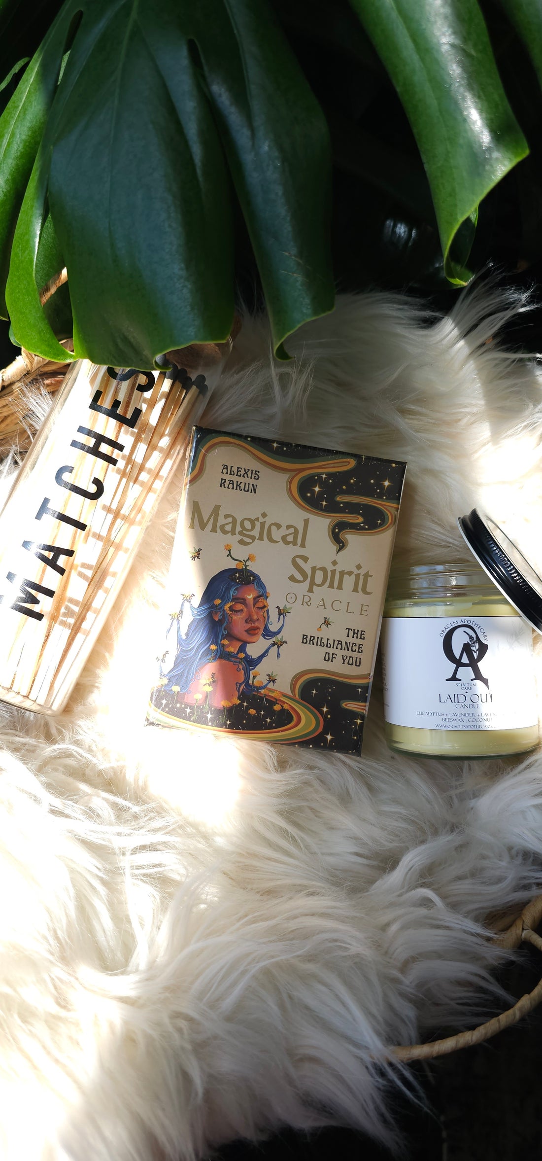 Magical Spirit Oracle deck next to matches and an oracles apothecary candle