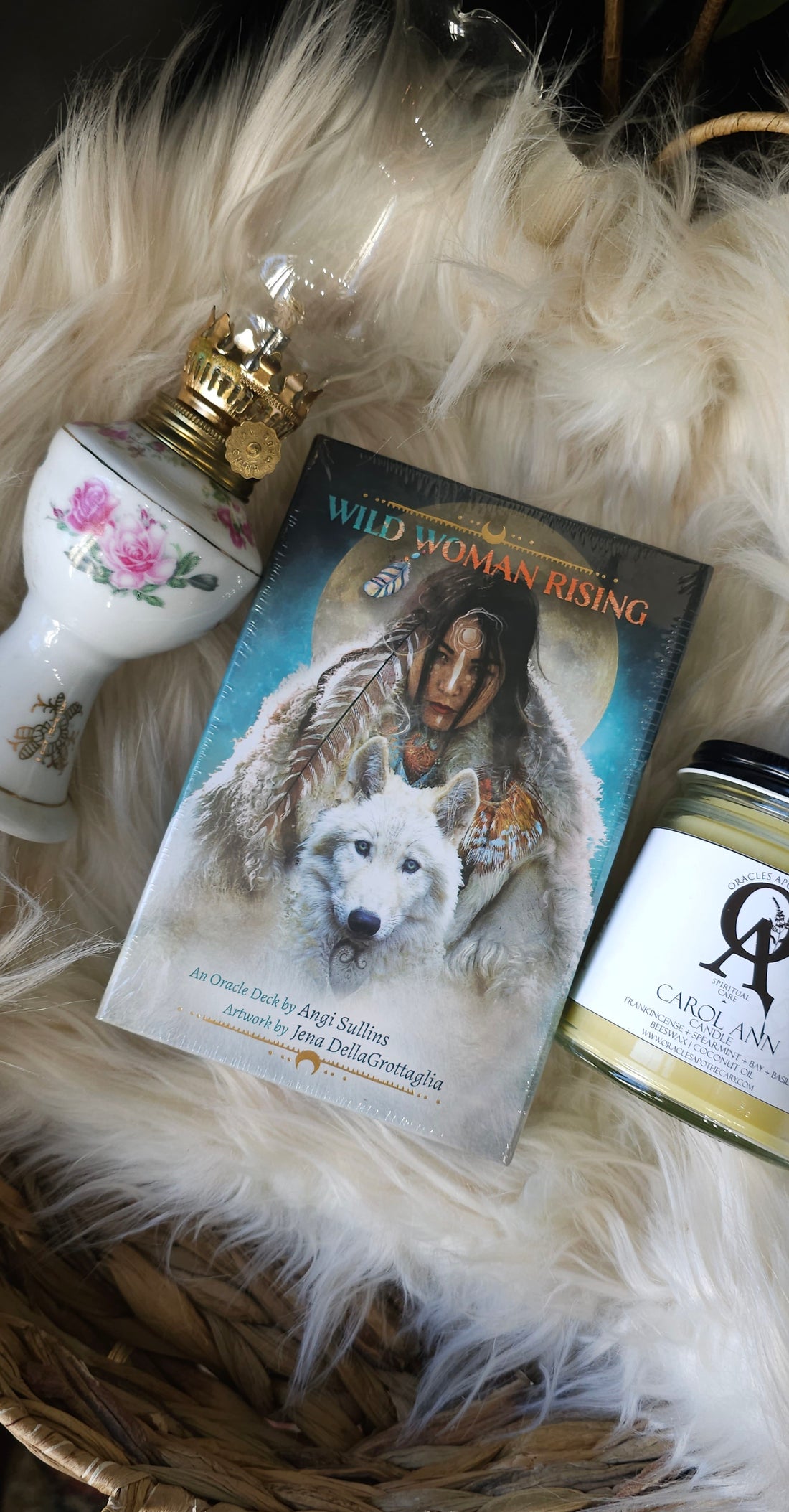 Wild Woman Rising Oracle deck lying on white fur