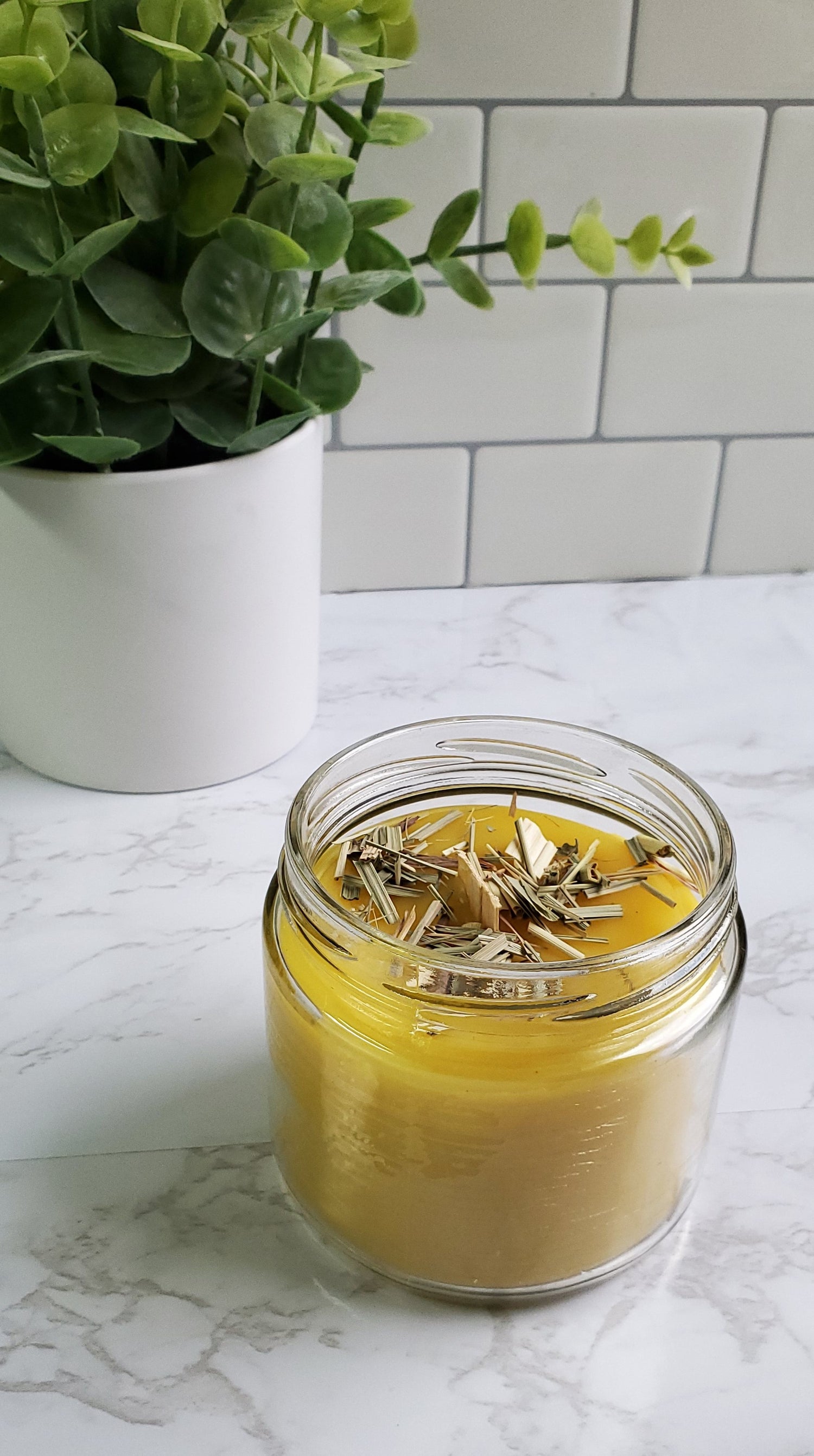 candle jar with whisper wood wick and herbs