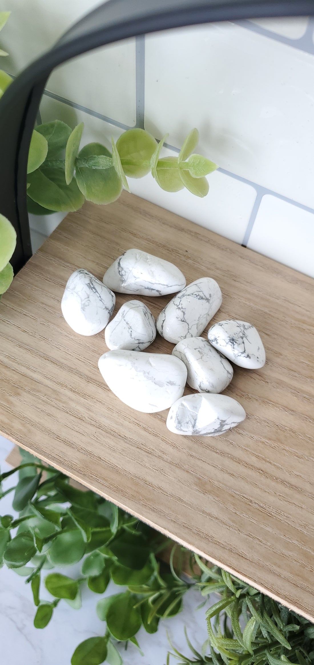 Howlite crystals stones piled up on shelf