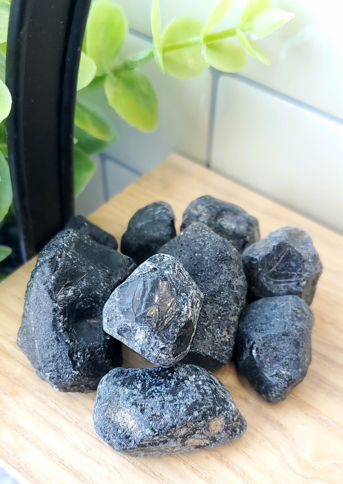 a pile of apache tear crystals stones