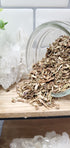 Hyssop spilling out of glass jar