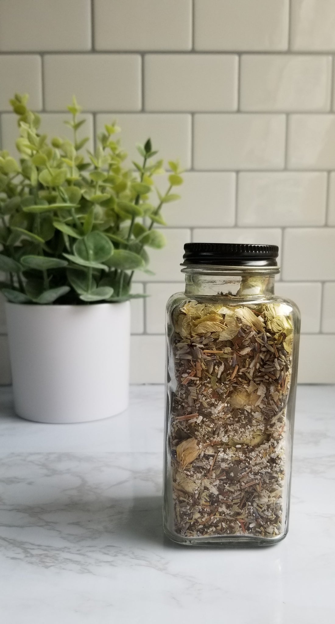 side Laid Out Bath sitting on white counter top