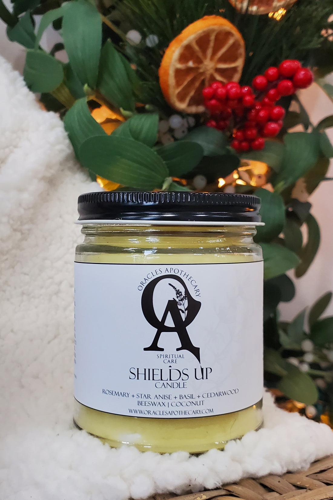 Shields Up Candle closed on a white fur