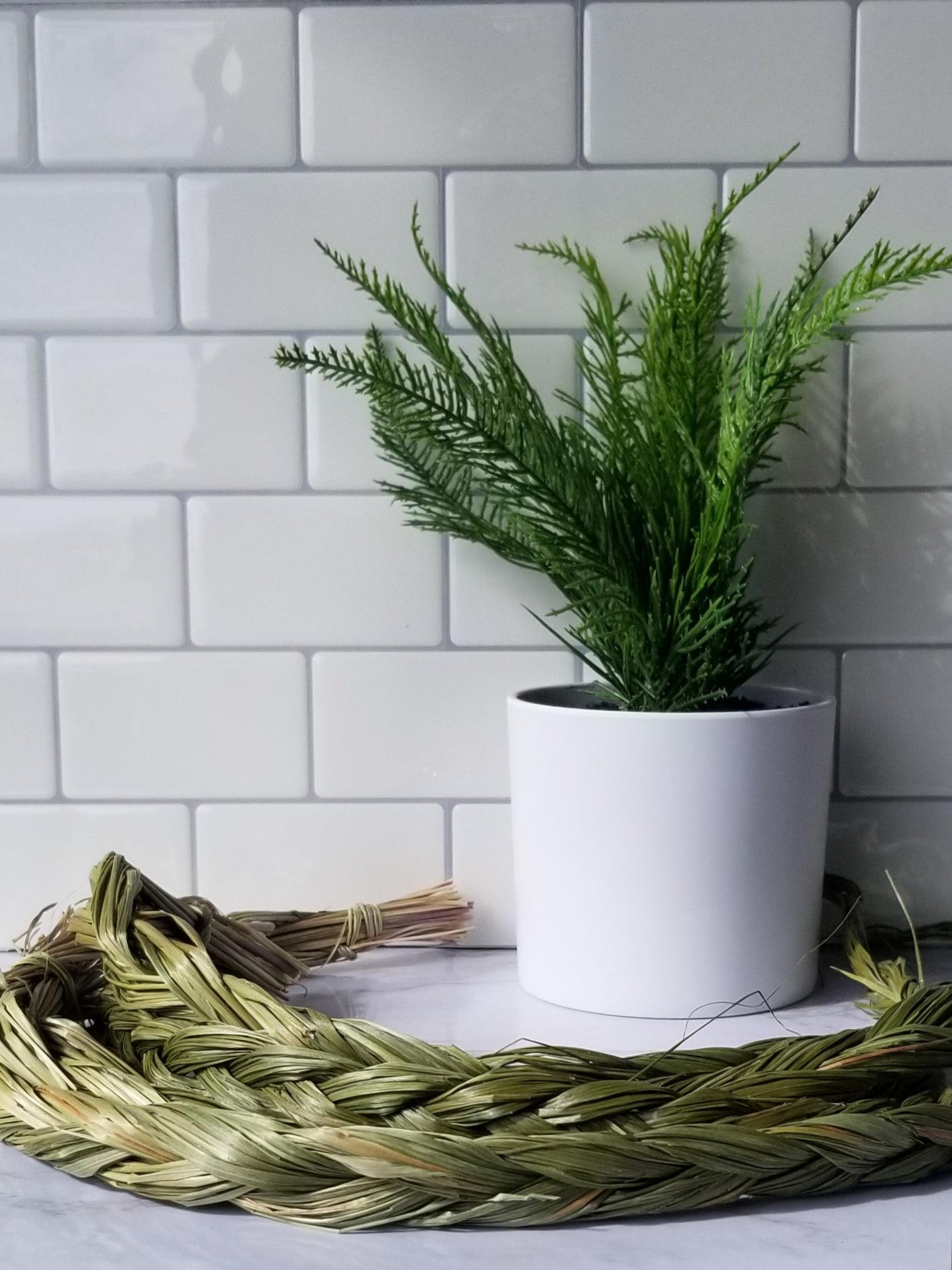 Sweetgrass Braids displayed on a white countertop