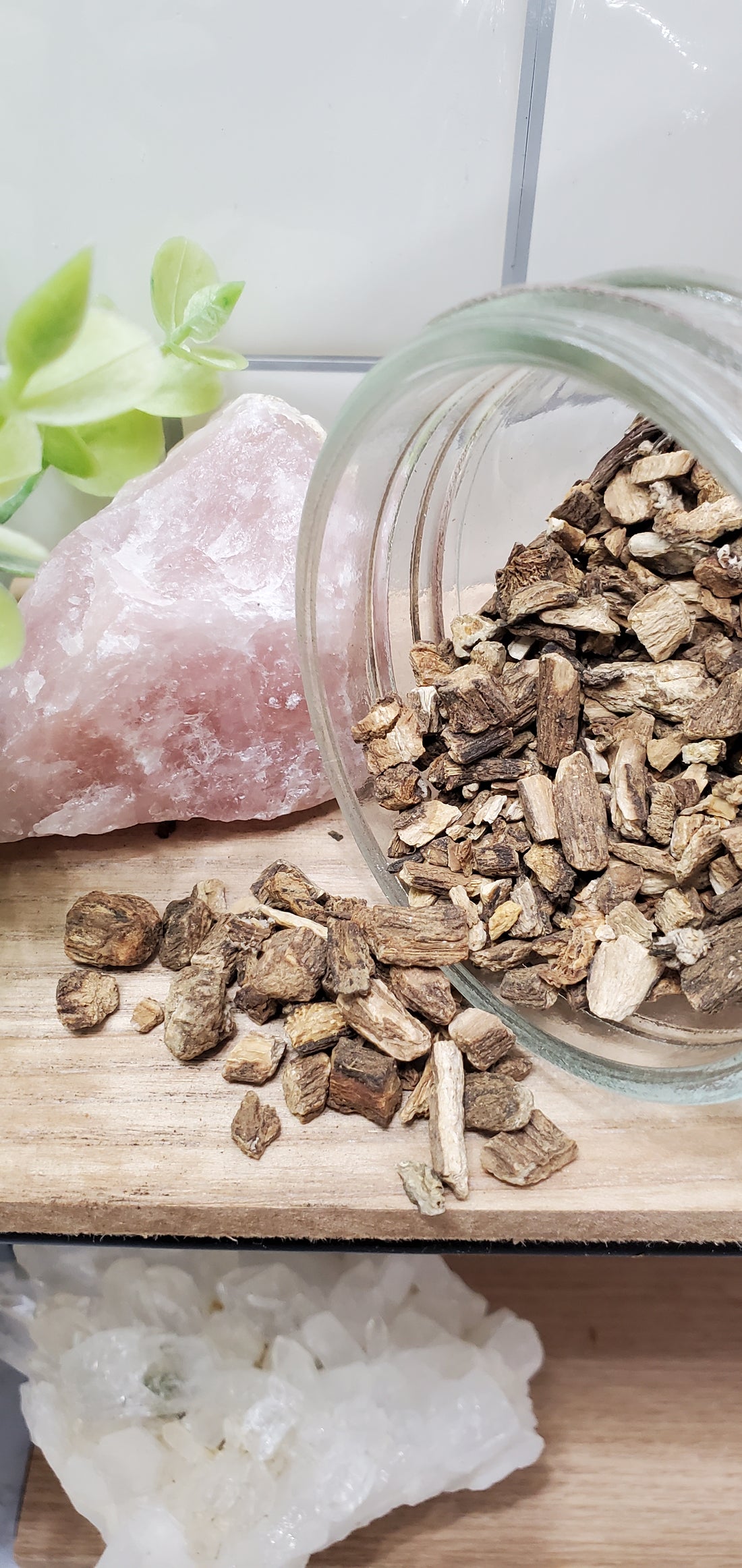 burdock root spilling out of a glass jar