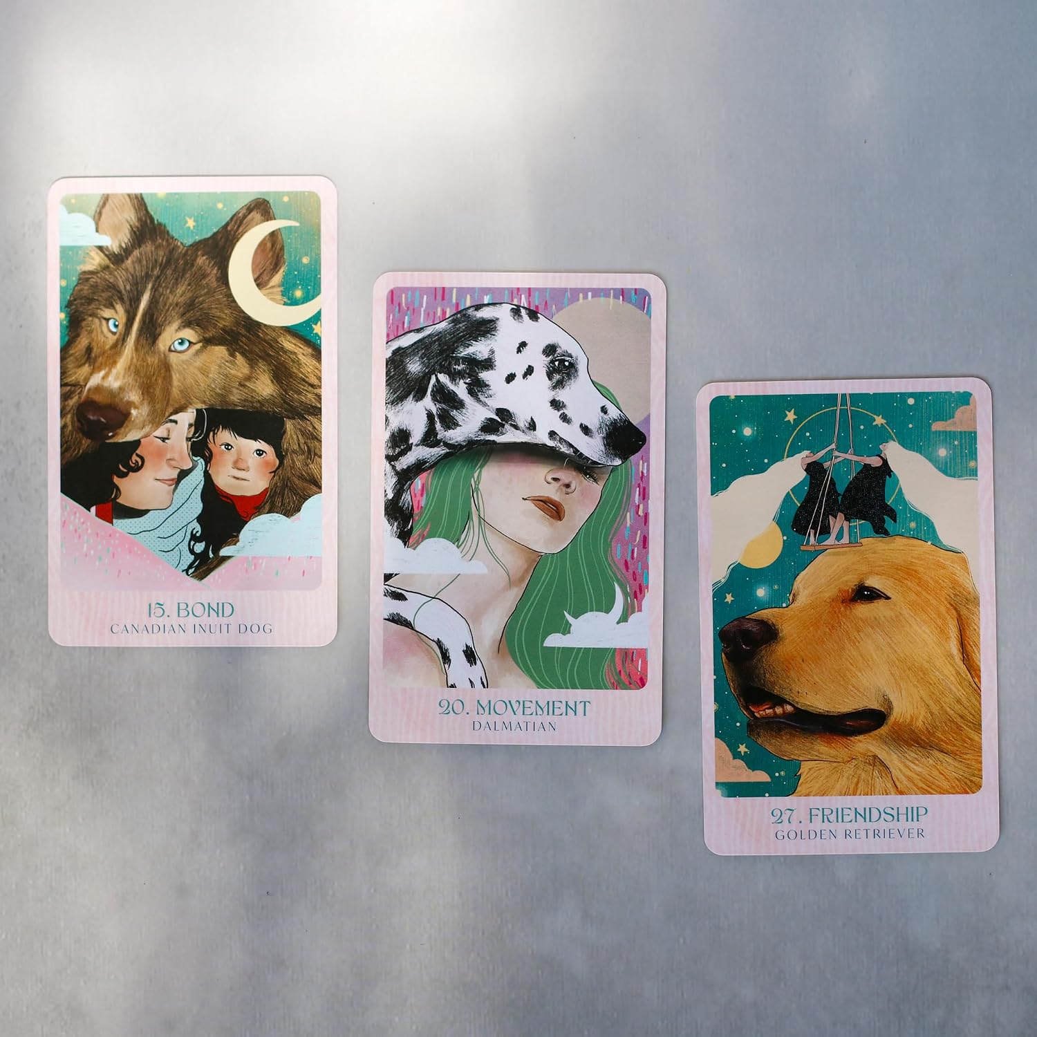 three cards with humans and dogs on each