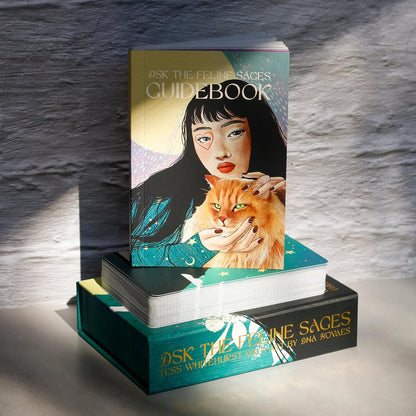pictured guidebook with woman on cover with red cat