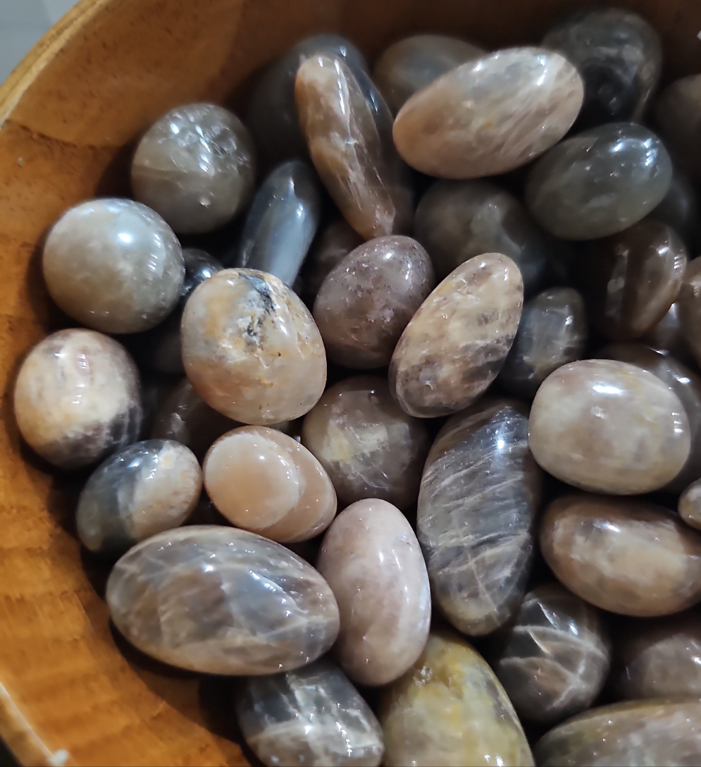 a bowl of Black Moonstone crystals stones