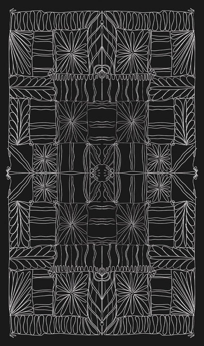 Decorative quilt with white geometric patterns on a black background