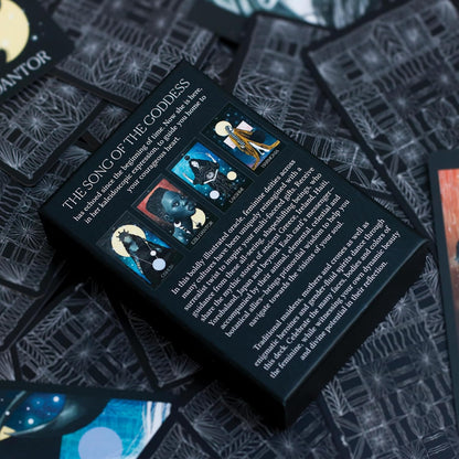 Close-up of a tarot card with text and images on a textured surface
