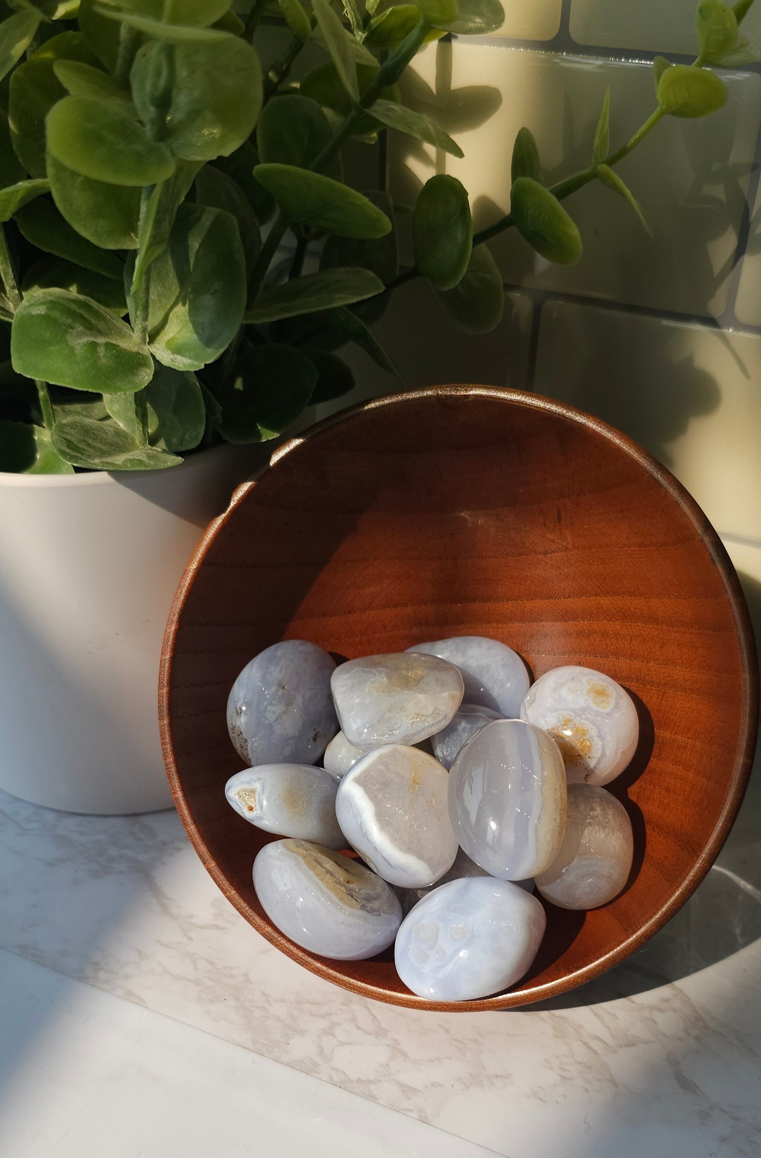 a bowl of Blue Lace Agate crystals stones