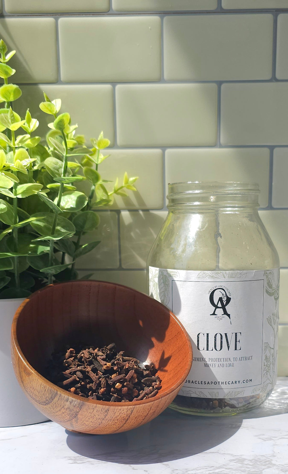 Clove piled up in a wooden bowl