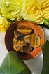 Happy Stones in a wooden bowl