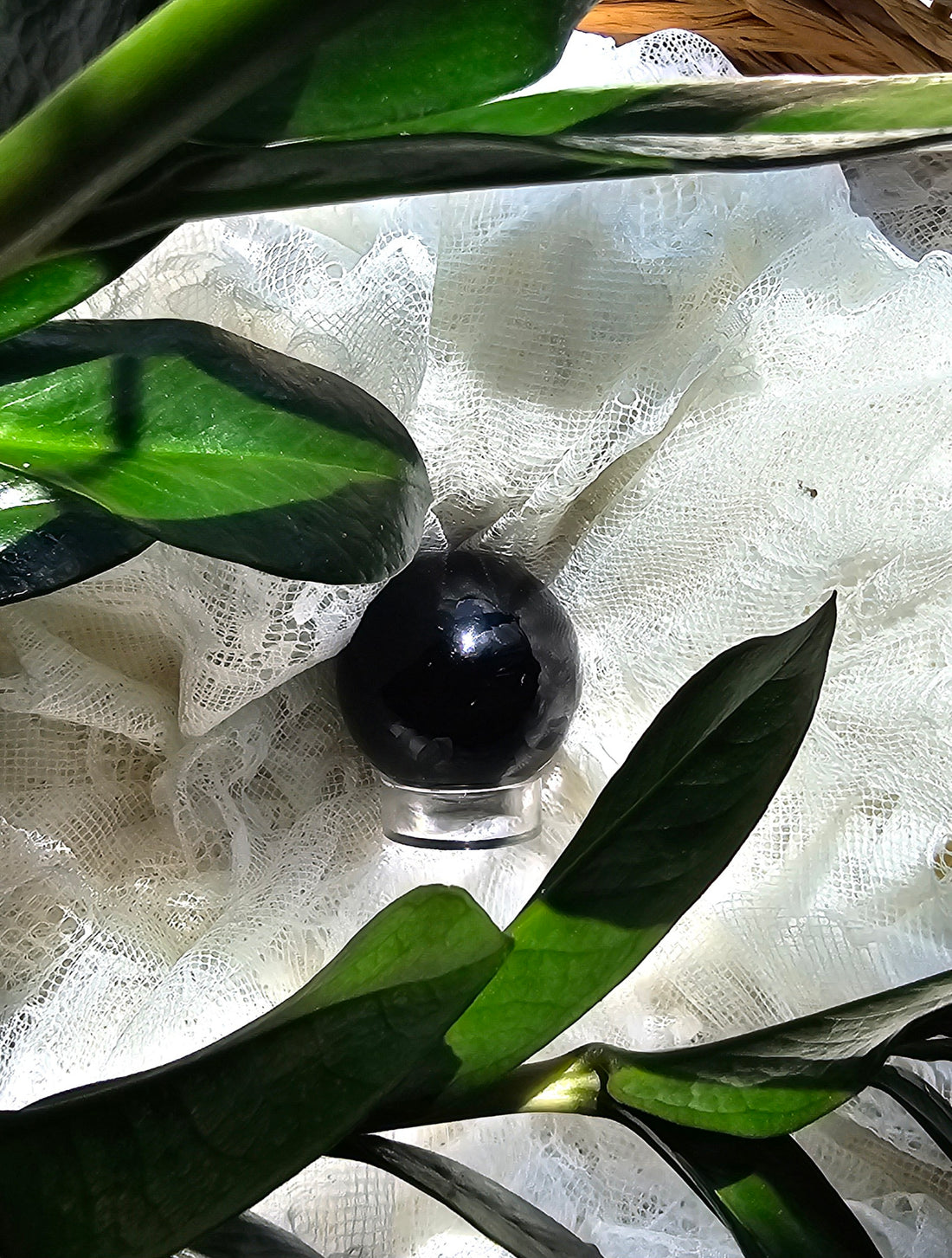 Obsidian Sphere surrounded by lace