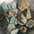 Ruby Fuchsite crystals stones piled in a white bowl