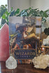 Wizards Tarot deck sitting on wooden table