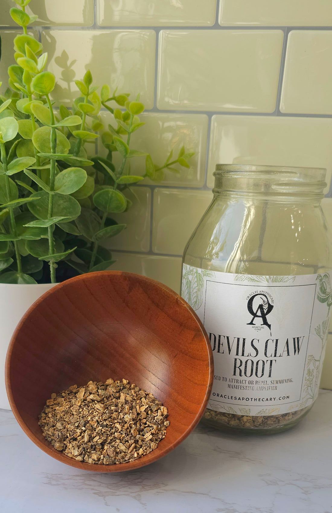 devils claw root herbs in a wooden bowl