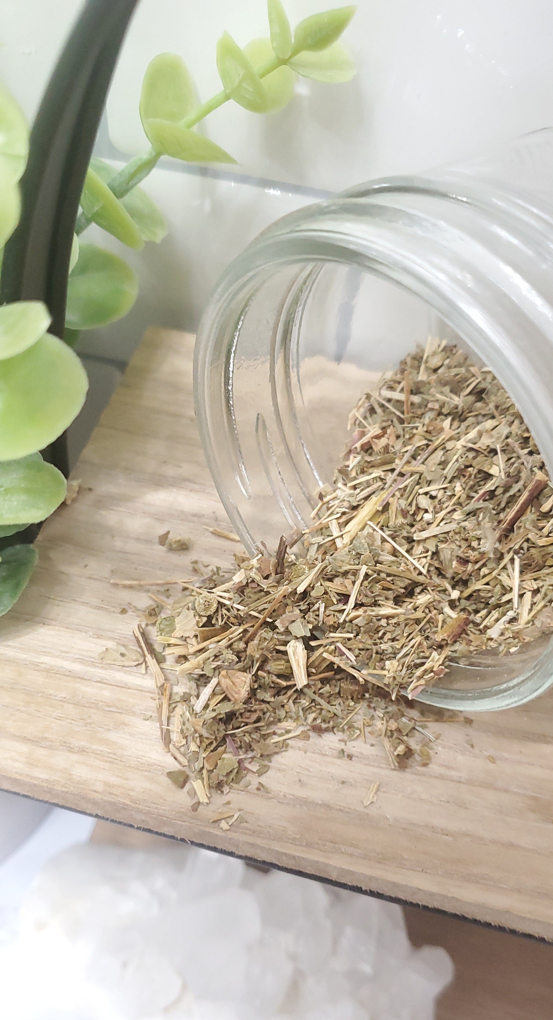 Agrimony herbs in a glass jar