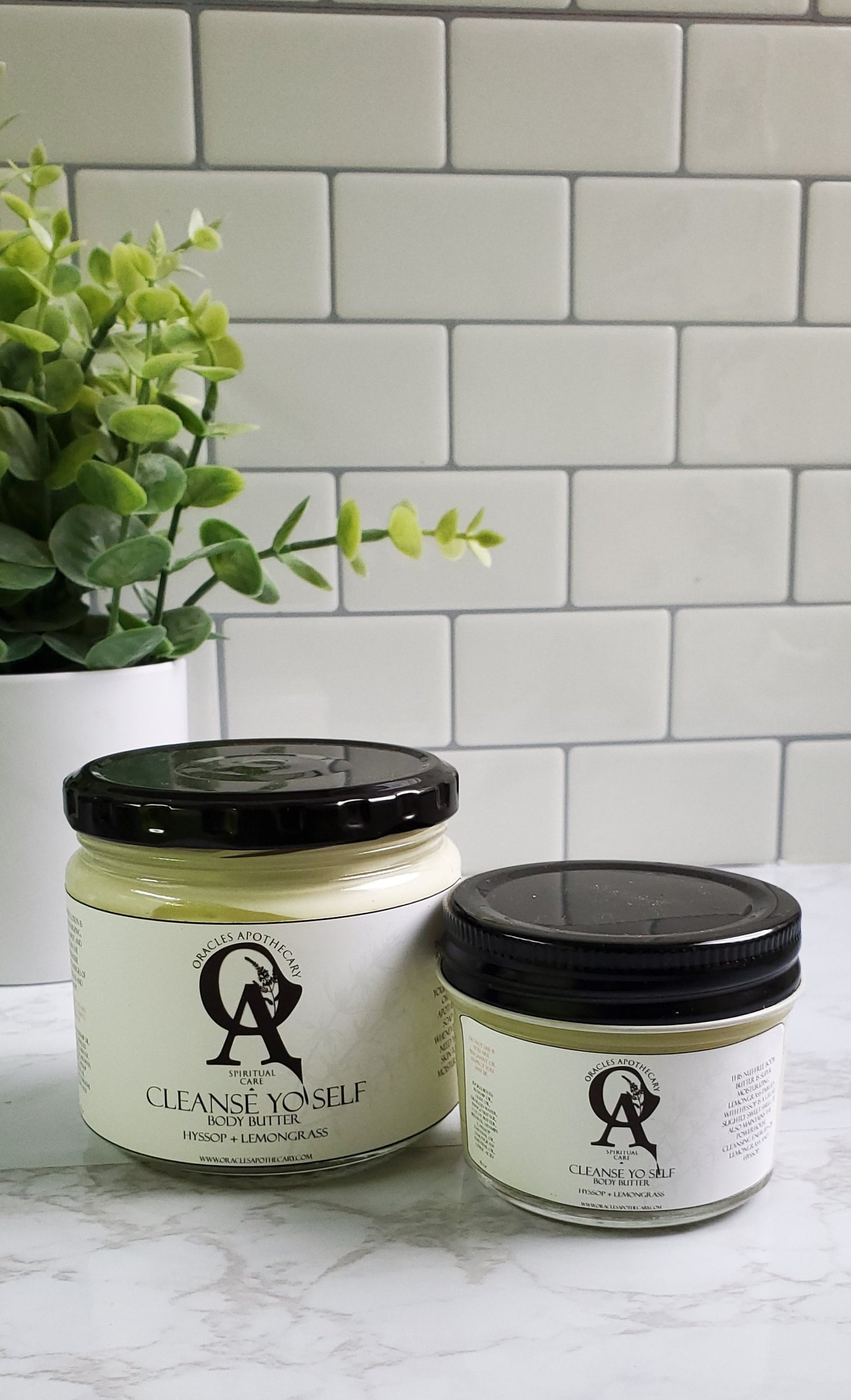 two glass jars of body butter 4 oz and 8 oz