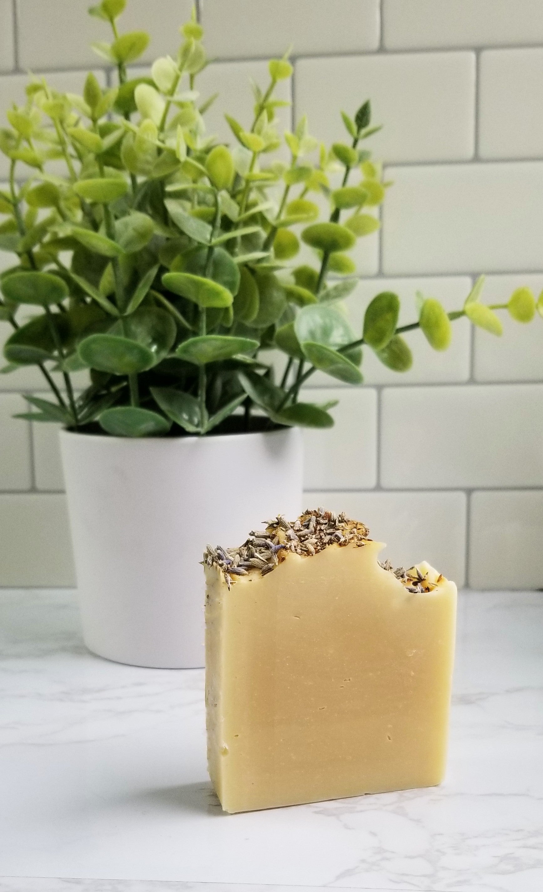 soap with herbs on top