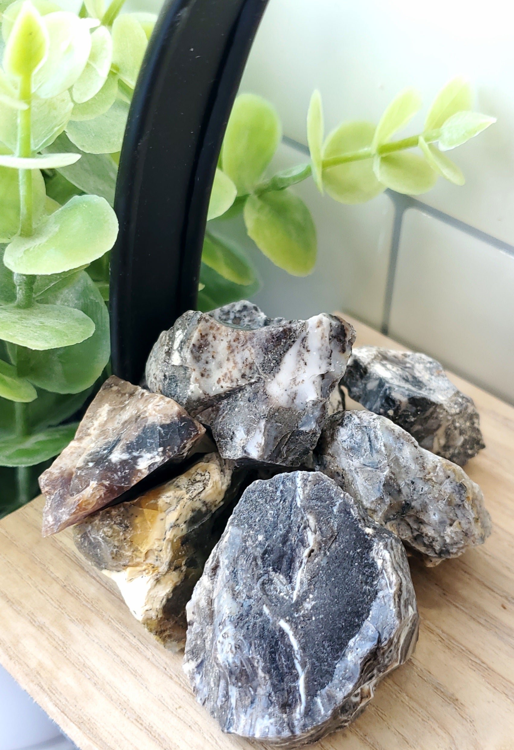 a pile of Black Opal RAW crystals stones