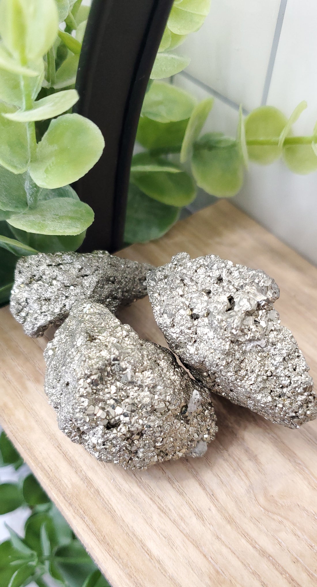 Chipsa Pyrite piled up on a table