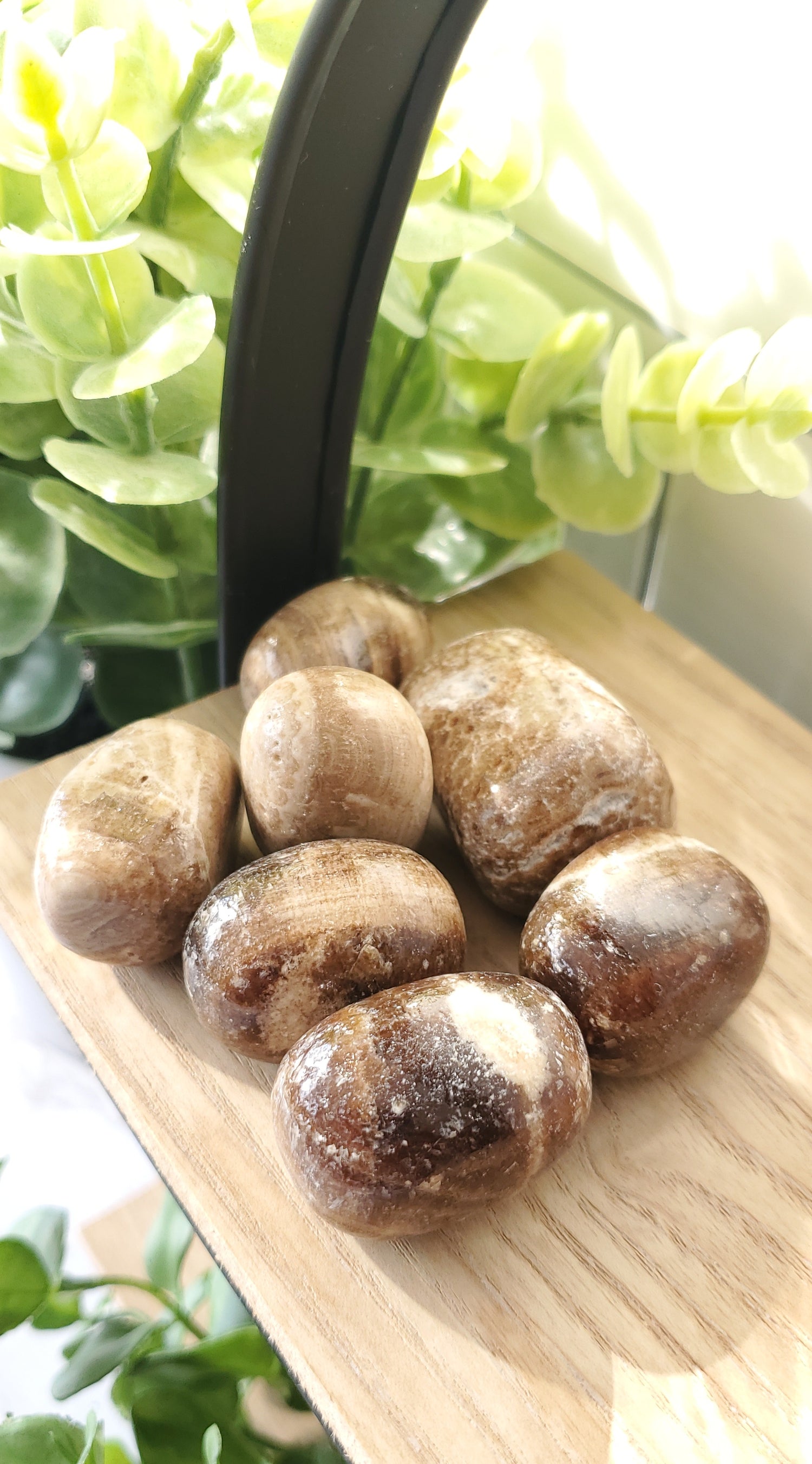 Chocolate Calcite piled up on a table