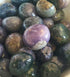 Grape Agate pile in a bowl