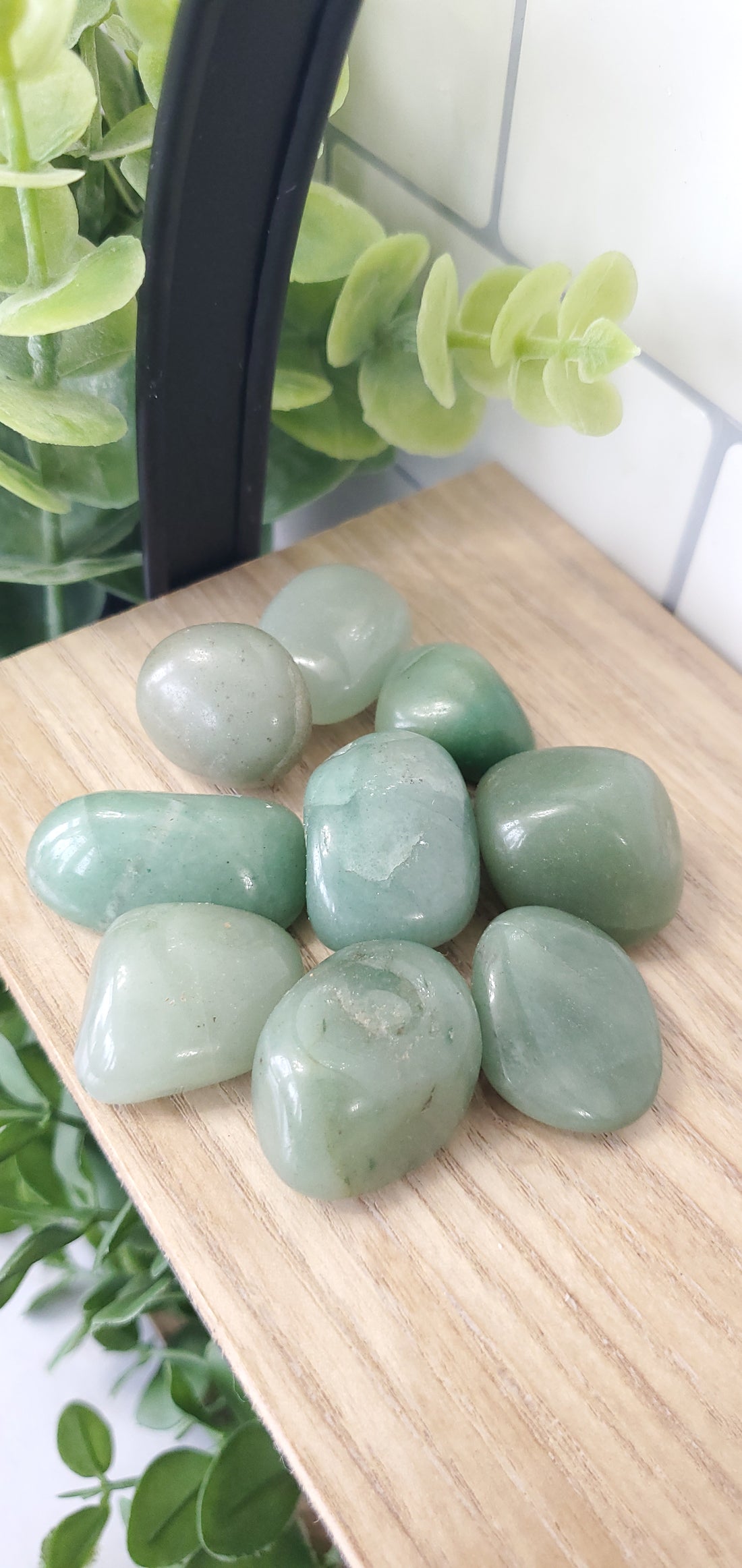 Green Aventurine piled up on a shelf