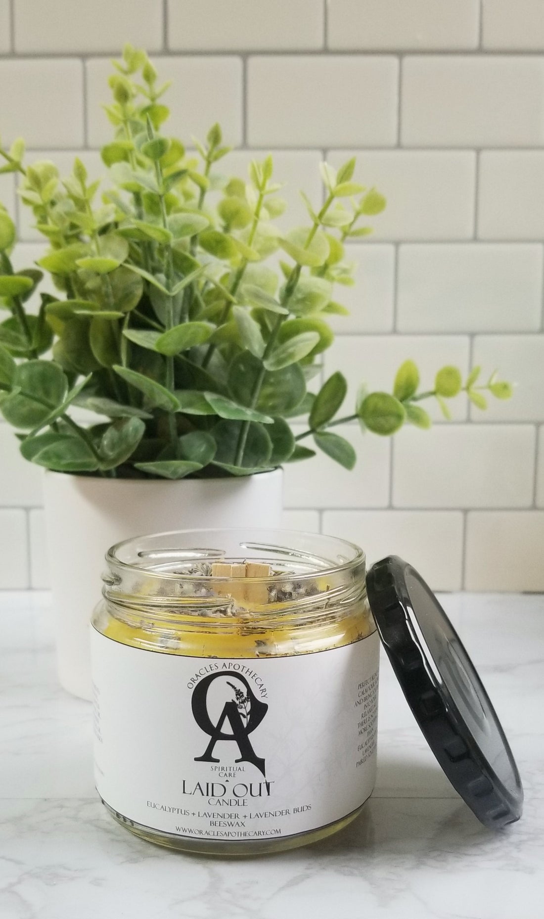 Laid Out candle jar with whisper wood wick and herbs