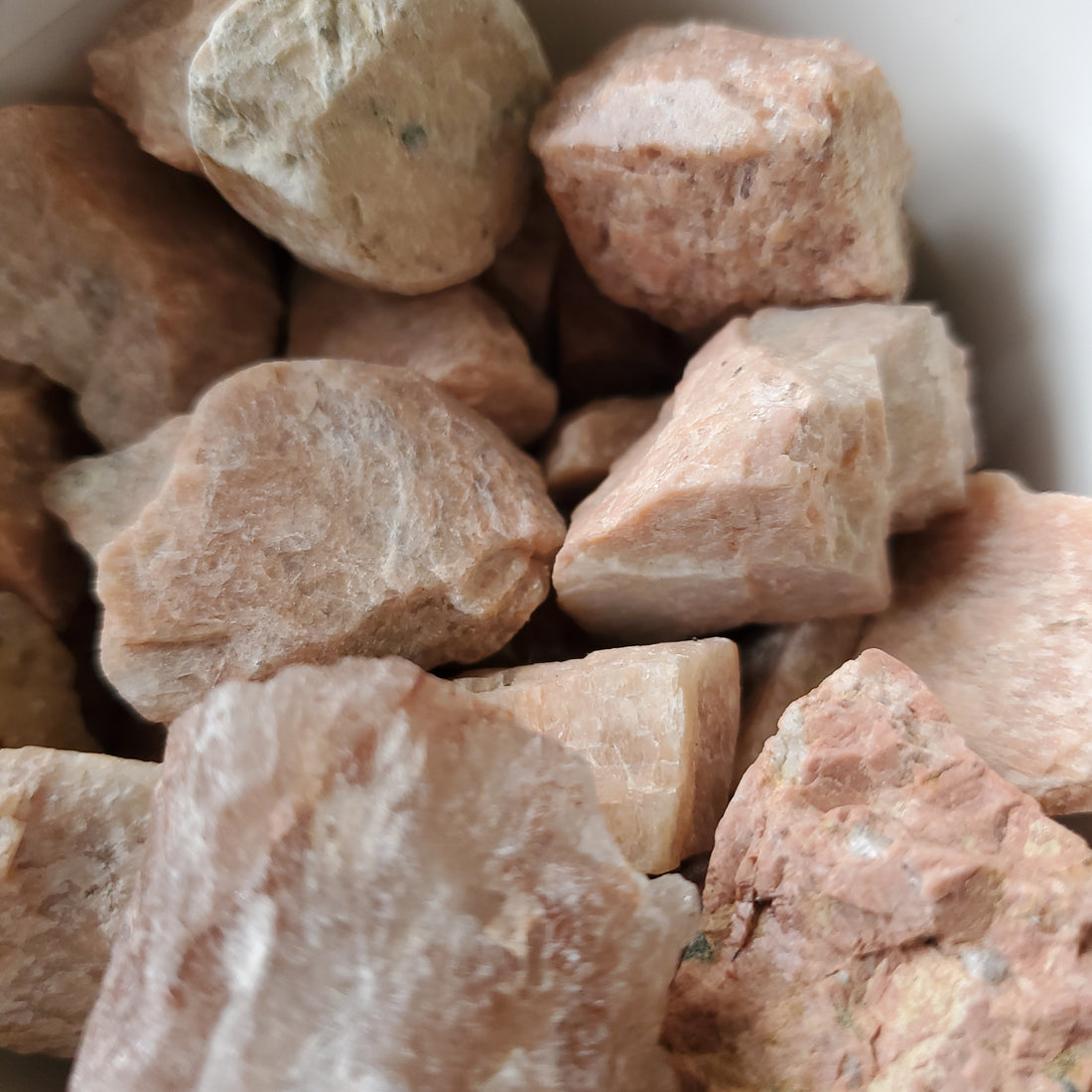 Peach Moonstone Raw crystals stones in a bowl
