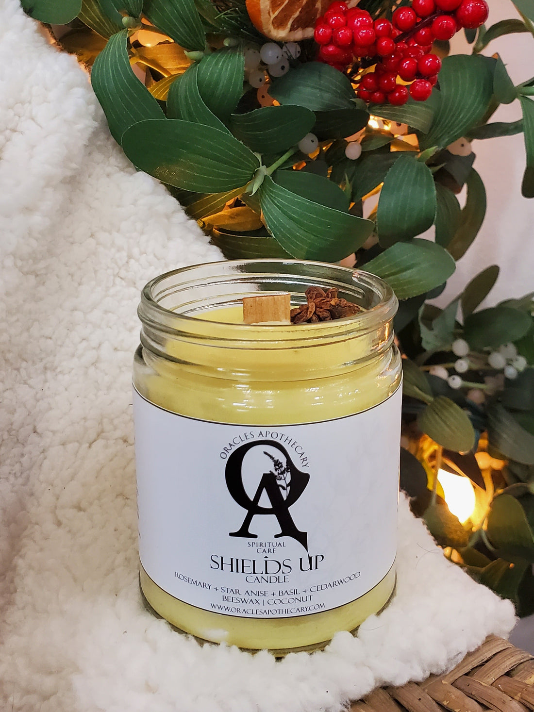 Shields Up Candle sitting on white fur
