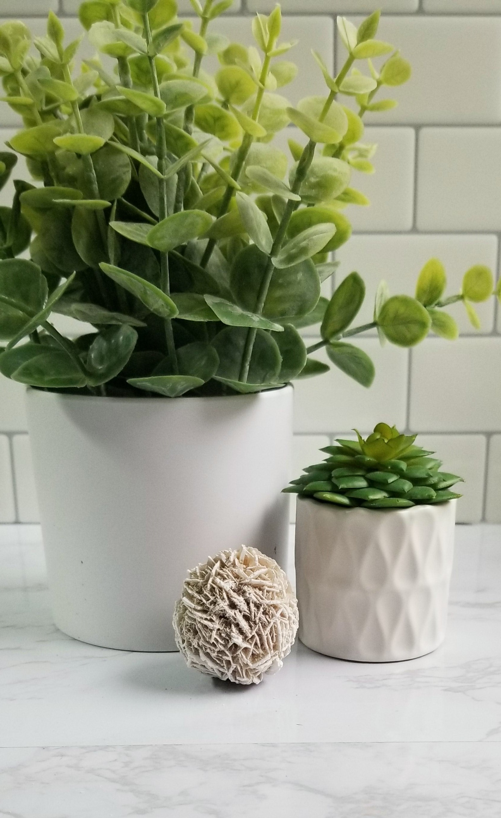 desert rose selenite sitting on a white table